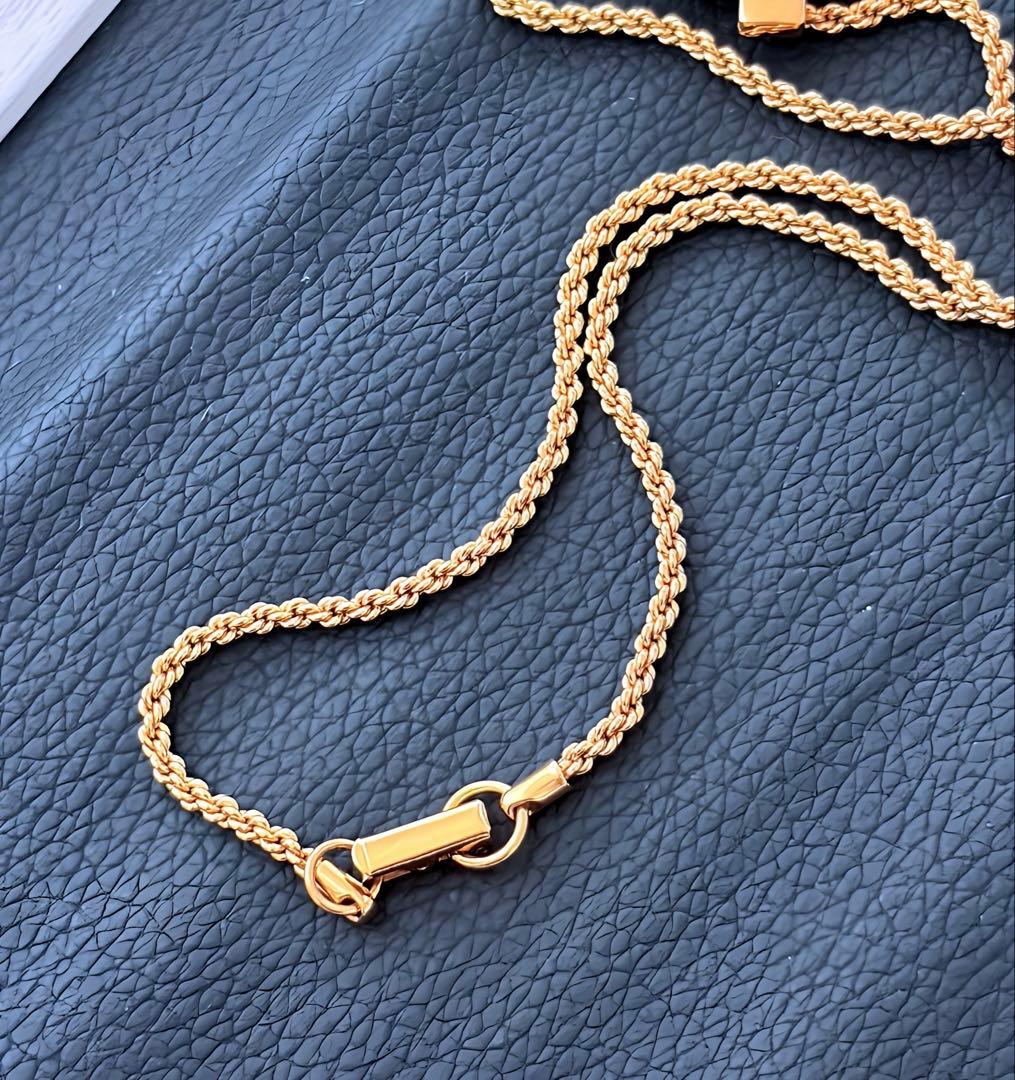 SWAROVSKI クロス ネックレスゴールドカラーF200