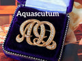 AquascutumロゴモチーフヴィンテージブローチH30